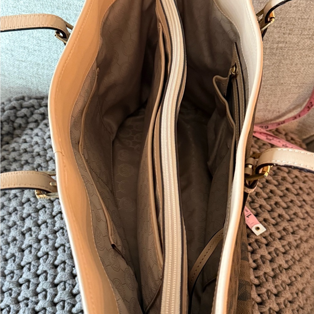 MICHAEL Michael Kors Jet Set travel tote in a brown checkered monogram pattern. - Picture 5 of 10